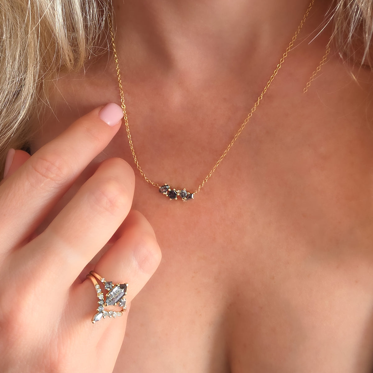 Galaxy necklace worn on the neck: natural Salt & Pepper Diamonds in oval, hexagon, kite and round cuts – Dina Jewelry