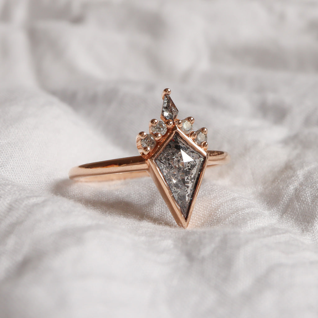 Salt & Pepper kite shape diamond in rose gold accented with natural grey diamonds.