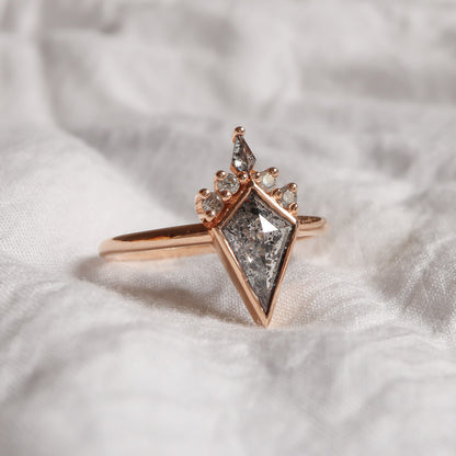 Salt & Pepper kite shape diamond in rose gold accented with natural grey diamonds.
