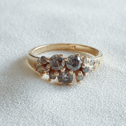 Galaxy cluster Salt & Pepper Diamond ring in 14K yellow gold, front view on white fabric – Dina Jewelry