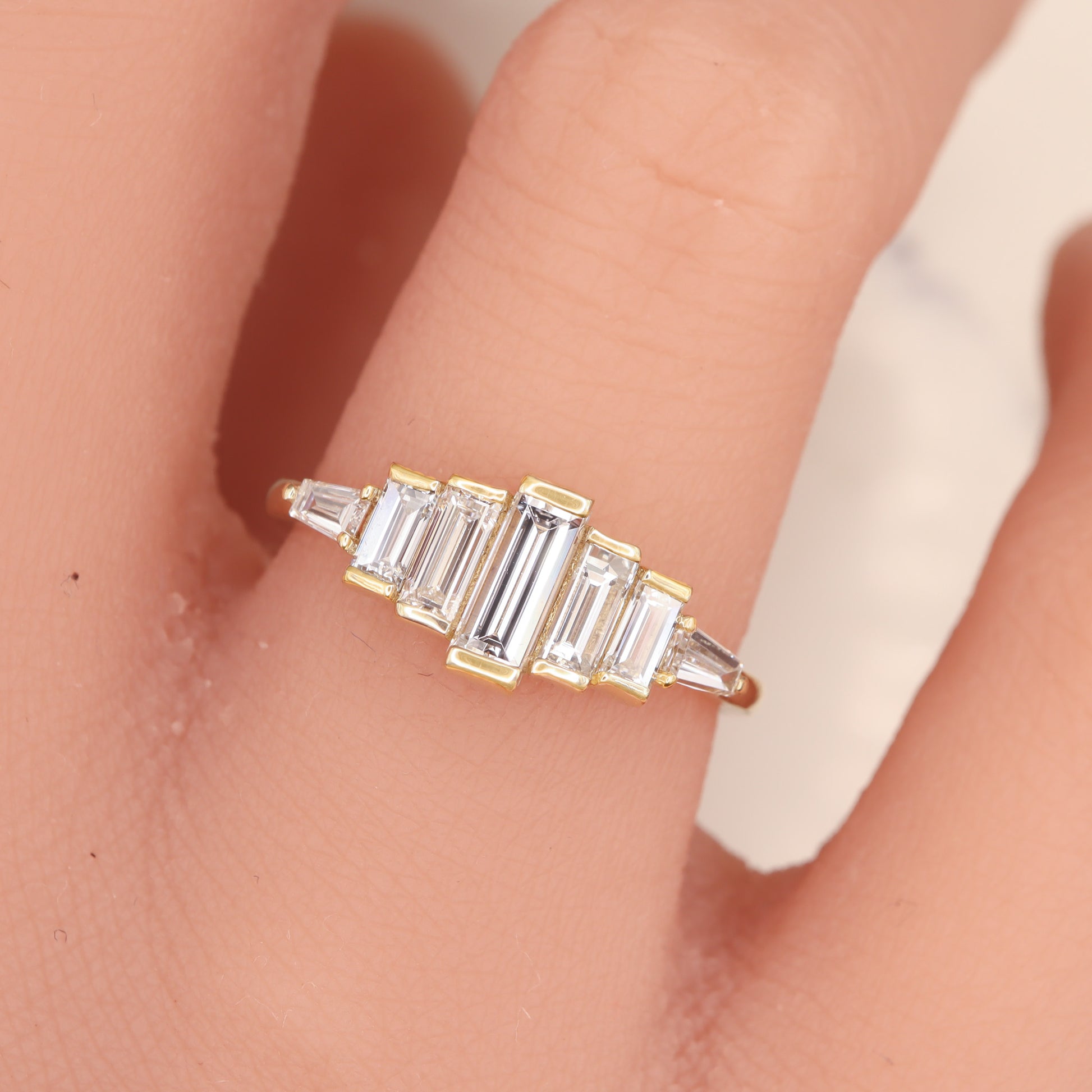 Dainty geometric Vertical baguette ring, with natural diamonds in half bezel setting.