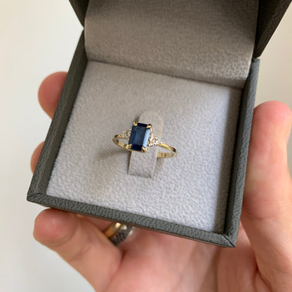 The Stunning Blue Sapphire Engagement Ring, nestled in a beautiful ring box, ready to symbolize a love that lasts a lifetime.